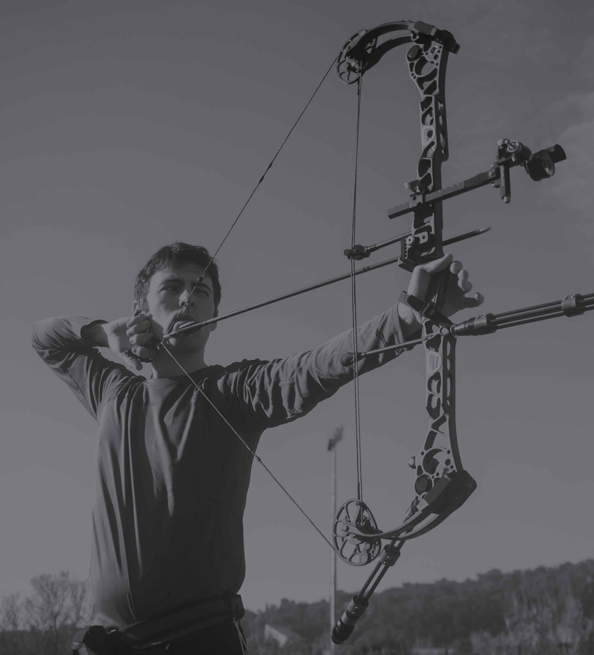 Archer at full draw with compound bow